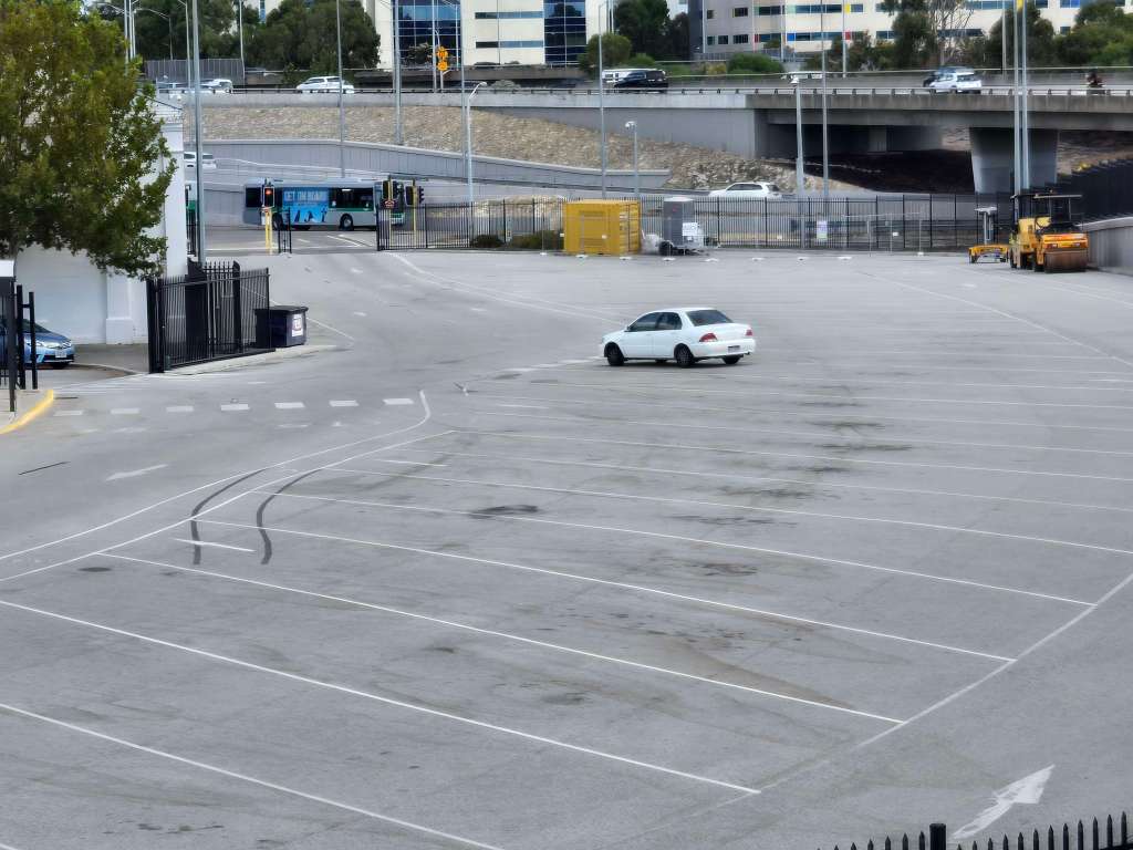 a single car in a parking lot